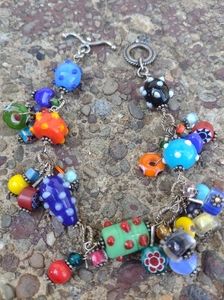 8 in charm bracelet with vintage art glass beads handmade